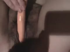 My dirty slut wife lets me watch her toying her large unshaved muff 